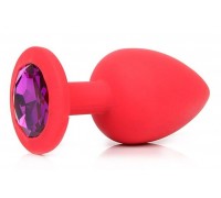 Красная силиконовая пробка с фиолетовым кристаллом размера L - 9,2 см.