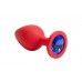 Красная силиконовая анальная пробка с синим стразом - 8,2 см.