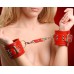 Красные кожаные наручники с цепочкой