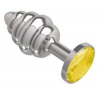 Серебристая спиралевидная анальная пробка с желтым кристаллом - 7 см.