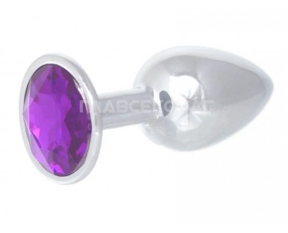 Серебристая анальная пробка с фиолетовым кристаллом - 7 см.