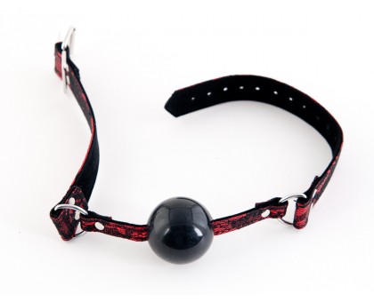 Чёрный кляп-шар с кружевным красным ремешком